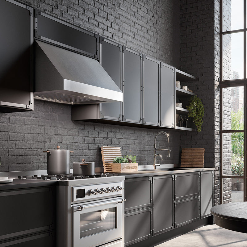 breva pro 18 stainless steel wall kitchen range hood in a modern industrial kitchen