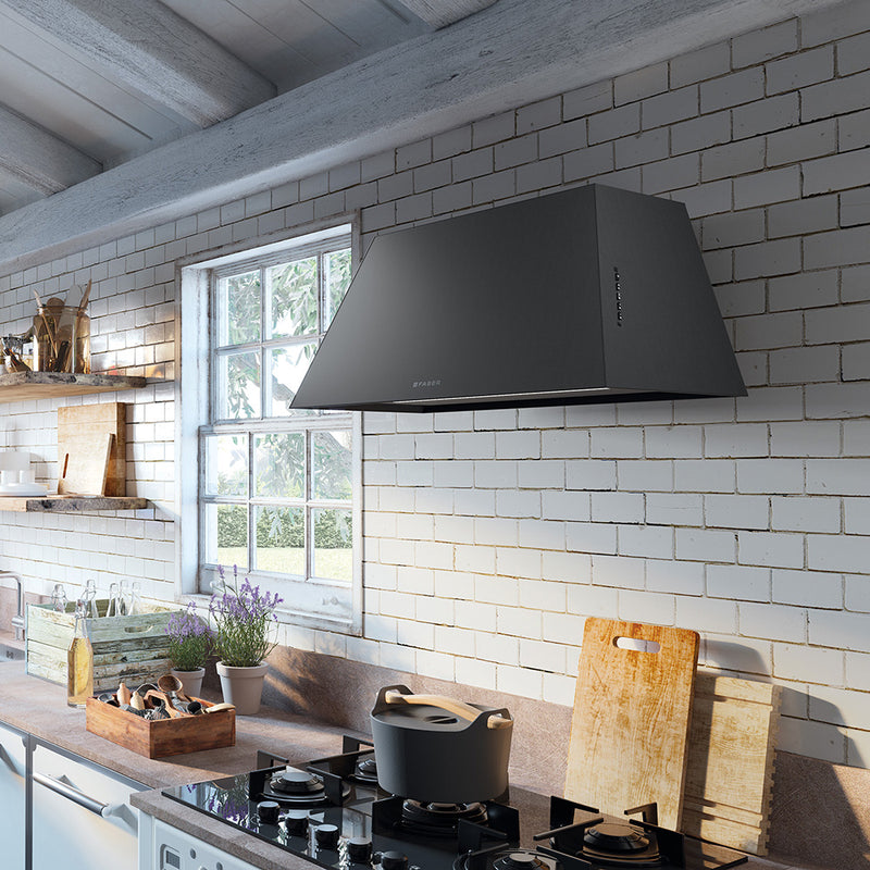 Painted Black Faber Chloe rustic style wall kitchen range hood in a farmhouse kitchen setting lifestyle image