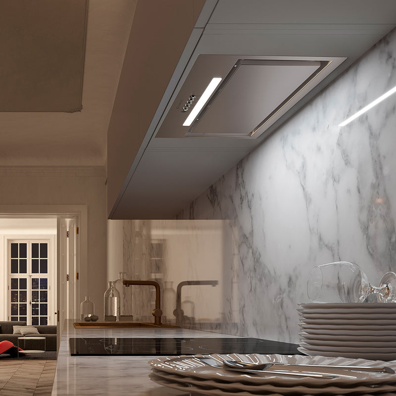 faber inca lux stainless steel insert kitchen range hood with buttons, perimeter aspiration and led bar light in a modern kitchen with marble counters and backsplash