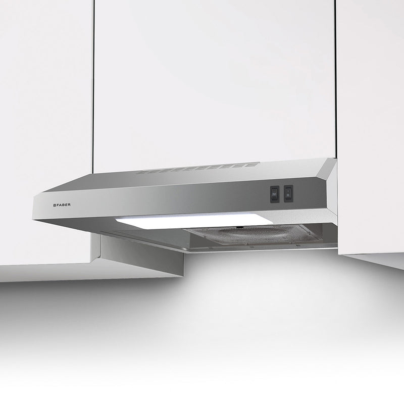 lifestyle image of faber levante E stainless steel under cabinet kitchen range hood in a simple white cabinet setting.