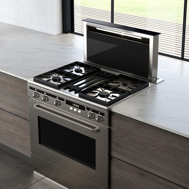 Faber Scirocco Lux down draft hood paired with a gas stove top and oven in a bright kitchen