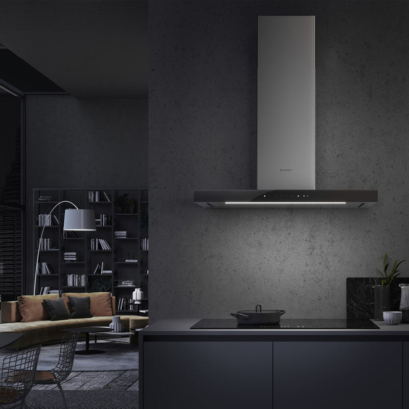 Faber Stilo Suprema range good in a modern kitchen over a stove top. Scene is shot in the evening.